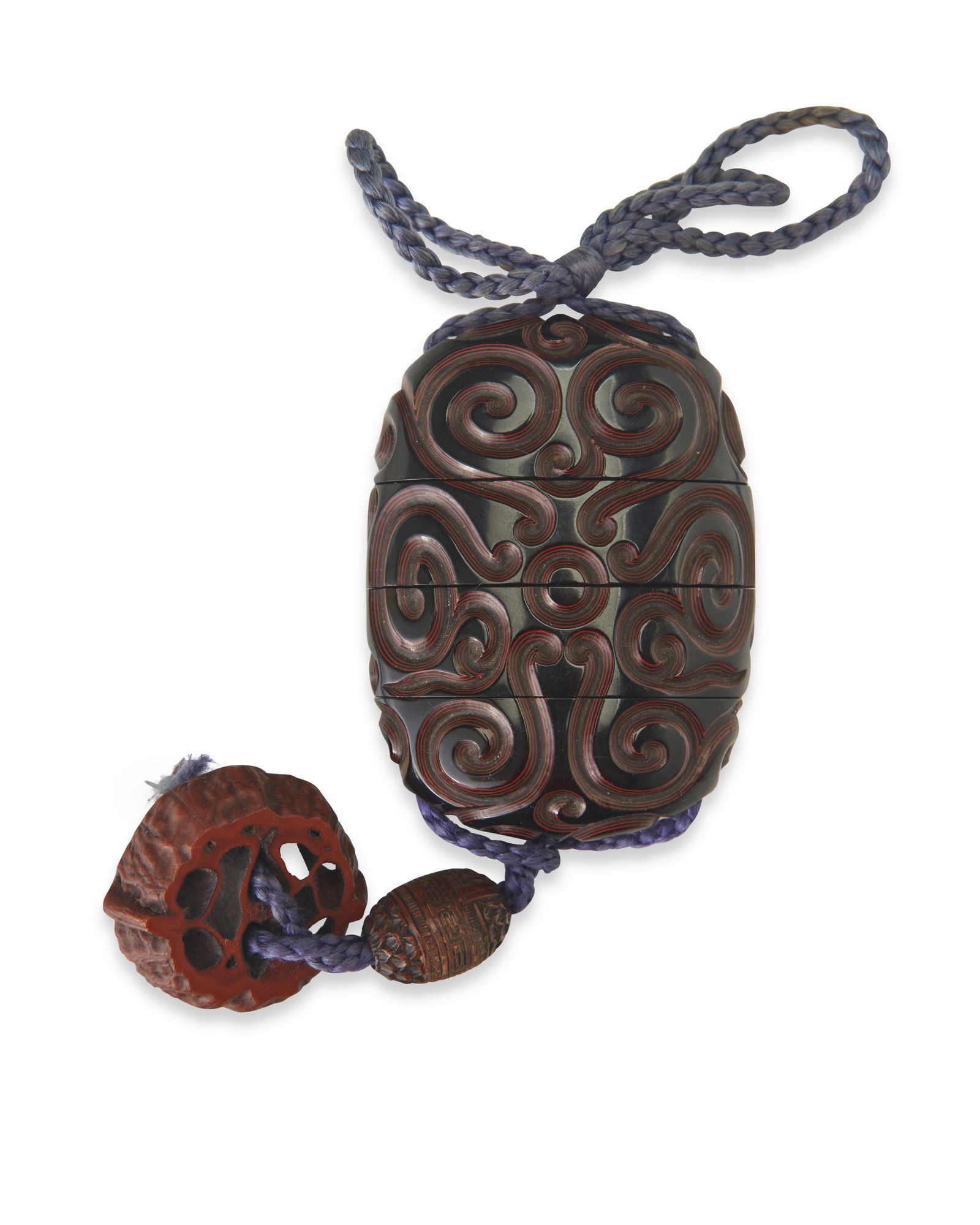 A Japanese carved guri lacquer inro (1 of 2)