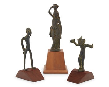 Three bronze figures