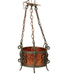 A Spanish Colonial-style iron and mica ceiling lamp