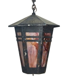 An Arts & Crafts-style iron and slag glass ceiling lamp