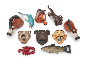 A group of enameled cast iron figural bottle openers