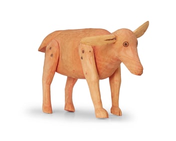 Attributed to Manuel Jimenez Ramirez (1919-2005), A carved wood alebrije dog, mid/late 20th century;