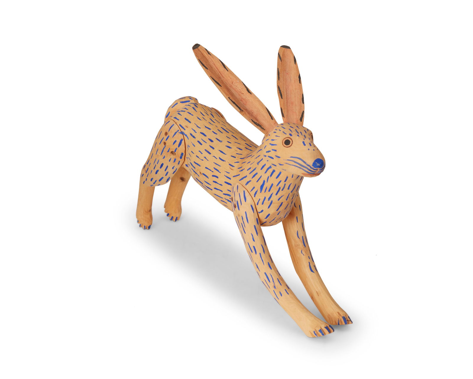 Attributed to Manuel Jimenez Ramirez (1919-2005), A carved wood alebrije rabbit, mid/late 20th (1 of 4)