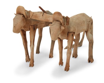 Attributed to Manuel Jimenez Ramirez (1919-2005), An early carved wood alebrije oxen group, mid-20th