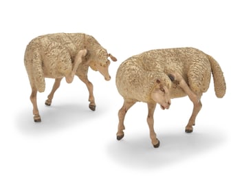 Two Latin American carved wood creche figures of sheep