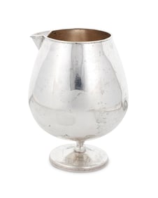 A Sanborns sterling silver footed pitcher