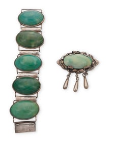 A group of Mexican silver and green stone jewelry