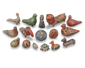 A large group of Tonala BruÒido pottery animals