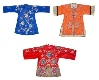 A group of Chinese women's embroidered silk robes/jackets
