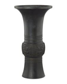 A Chinese cast metal gu form archaistic vase