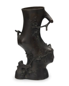 A Japanese bronze branch form vase