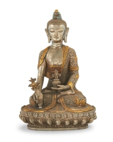 A Tibeto-Chinese parcel gilt and silvered bronze figure of Bhaisajyaguru