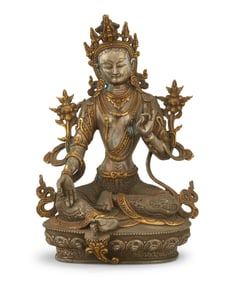 A Tibeto-Chinese parcel gilt and silvered metal figure of Tara