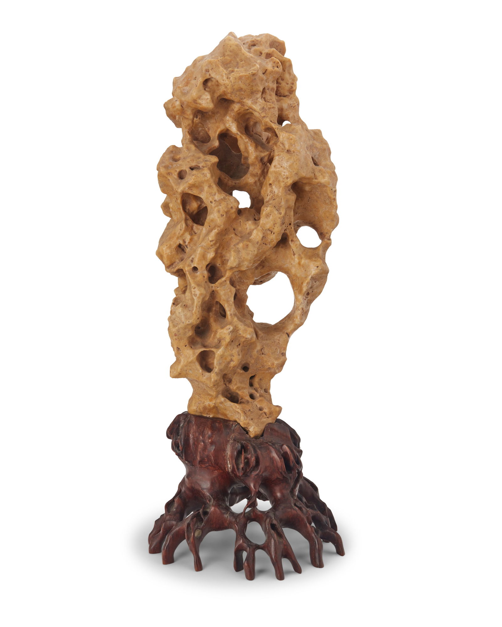 A Chinese Taihu scholar stone: A Chinese Taihu scholar stone 20th century The butterscotch stone mounted on a lacquered natural root-form base Stone: 21" H x 9" W x 8.5" D; Overall: 26.75" H