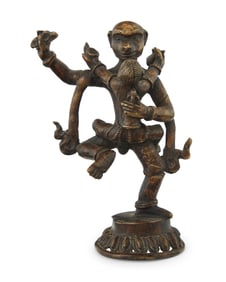 A Tibetan brass group of two figures in yabyum