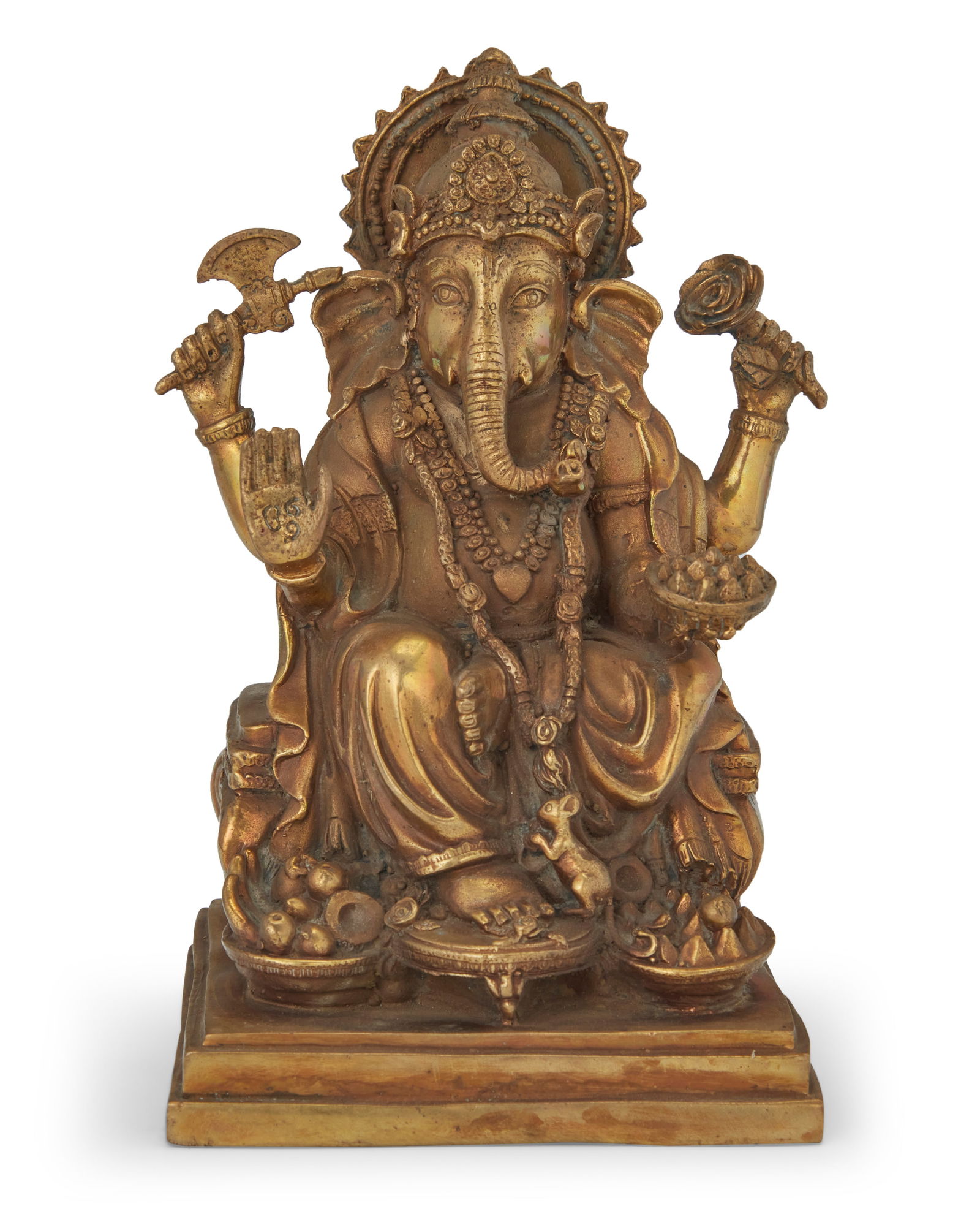 An Indian brass figure of Ganesha: An Indian brass figure of Ganesha 19th century or later With impressed seal to baseplate 6.5" H x 4.25" W x 4" D