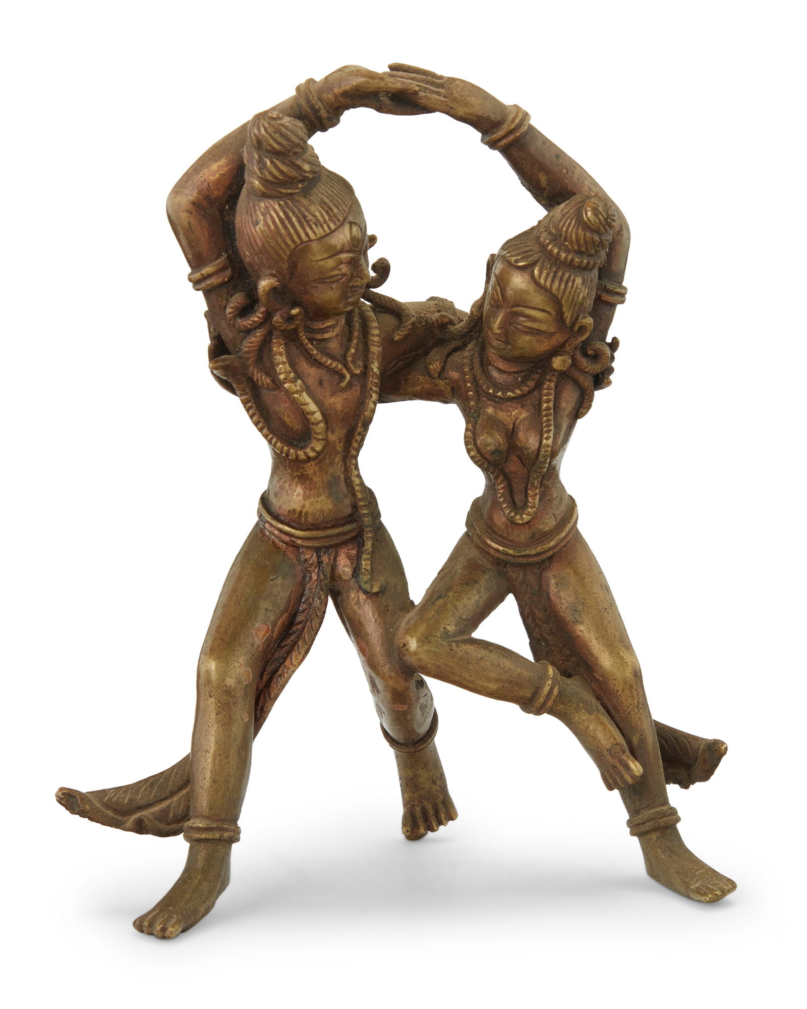 An Indian brass figural group of Shiva and Parvati dancing: An Indian brass figural group of Shiva and Parvati dancing 19th century or earlier 5.5" H x 4.5" Dia.