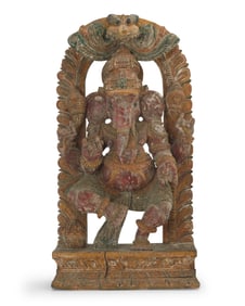 An Indian polychromed carved wood figure of Dancing Ganesha