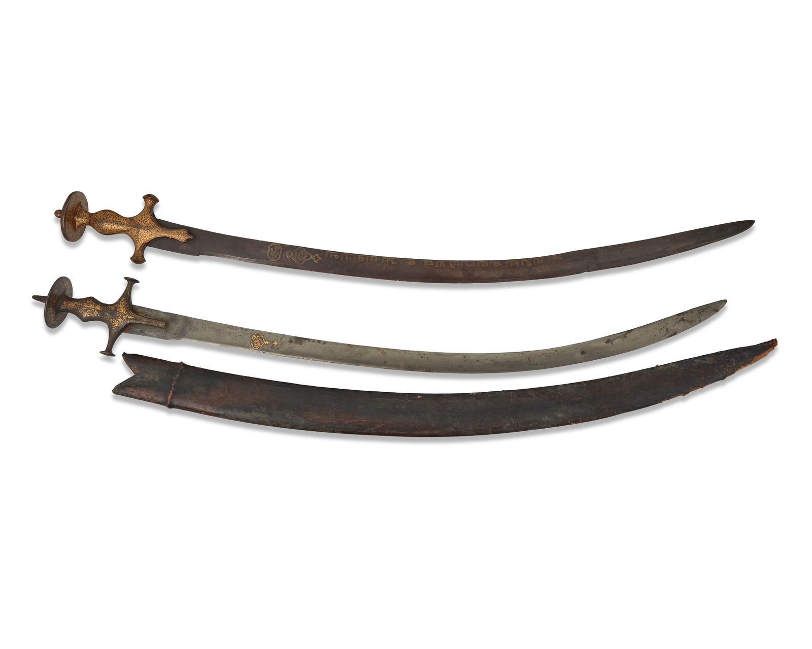 Two Indo-Persian 'shamshir' swords: Two Indo-Persian 'shamshir' swords18th centuryEach with gilt inscription to bladeWith gilt-decorated hilts2 piecesSheathed: 35.25" L, blade: 30.5" L, hilt 3.875" W; Unsheathed: 34.75" L, blade: 30" L,