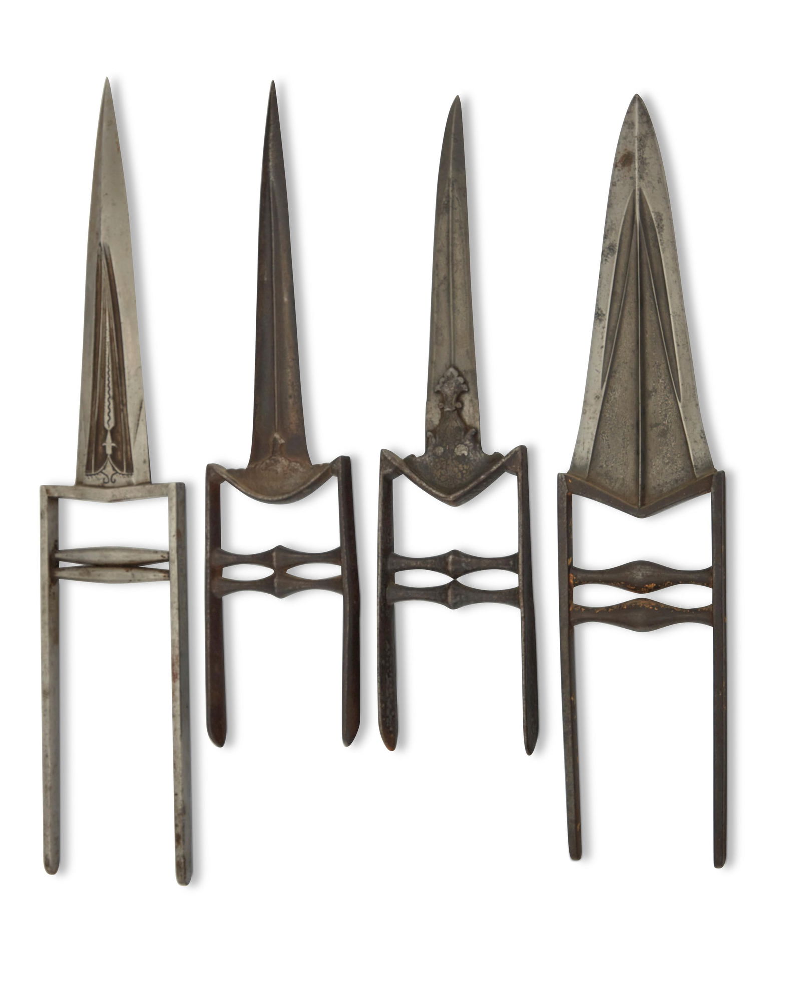 Four Indian 'katar' daggers: Four Indian 'katar' daggers18th/19th centuryLargest with later etched inscription to upper handleOne with traces of gilt decoration4 piecesLargest: 18" L x 3.5" W, blade 9.125" L; Shortest: 14" L x 3.