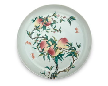 A large Chinese porcelain nine peach charger