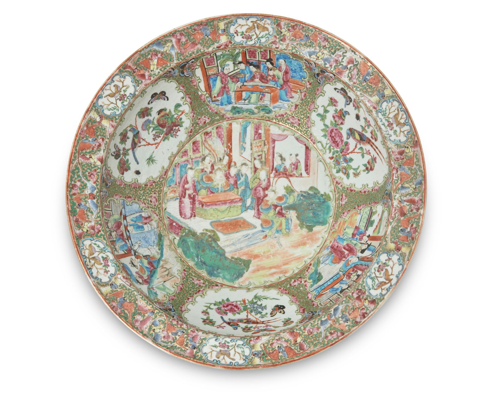 A Chinese Rose Medallion porcelain bowl: A Chinese Rose Medallion porcelain bowl Late Qing Dynasty (1644-1912) or later Depicting alternating figural court scenes and birds with butterflies in friezes 5" H x 16.125" Dia. Provenance: The
