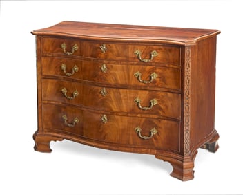 A George III style mahogany serpentine chest