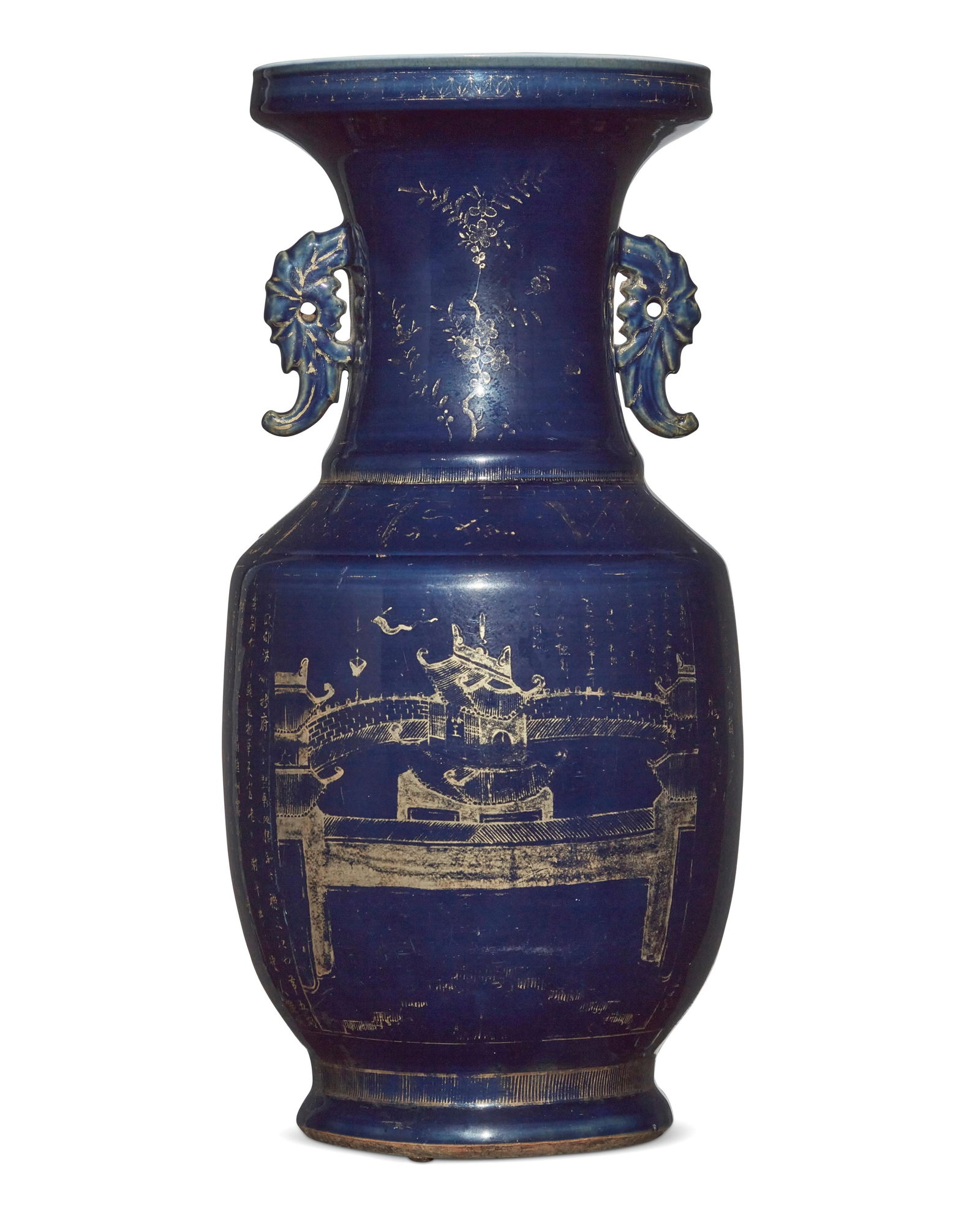 A Chinese cobalt blue porcelain vase: A Chinese cobalt blue porcelain vaseLikely Late Qing Dynasty (1644-1912), circa 19th centuryUnmarkedWith pierced foliate handles, gilt decorated depicting a compound and various foliate motifs and geo