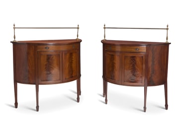 A pair of George III style mahogany demilune serving tables