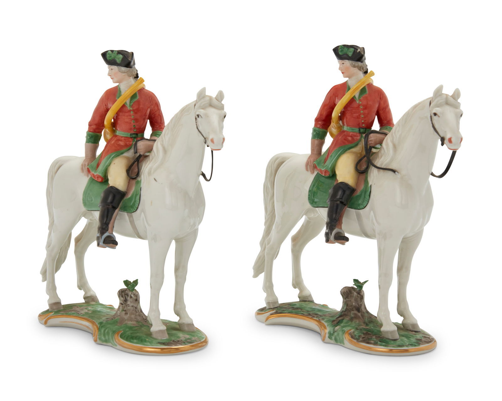 A pair of Nymphenburg porcelain equestrian groups: A pair of Nymphenburg porcelain equestrian groups1910-1975Each with green underglaze factory mark; impressed: [shield mark] / 551 / 2From the "Red Hunt" series, originally modeled by Theodor K‰rner