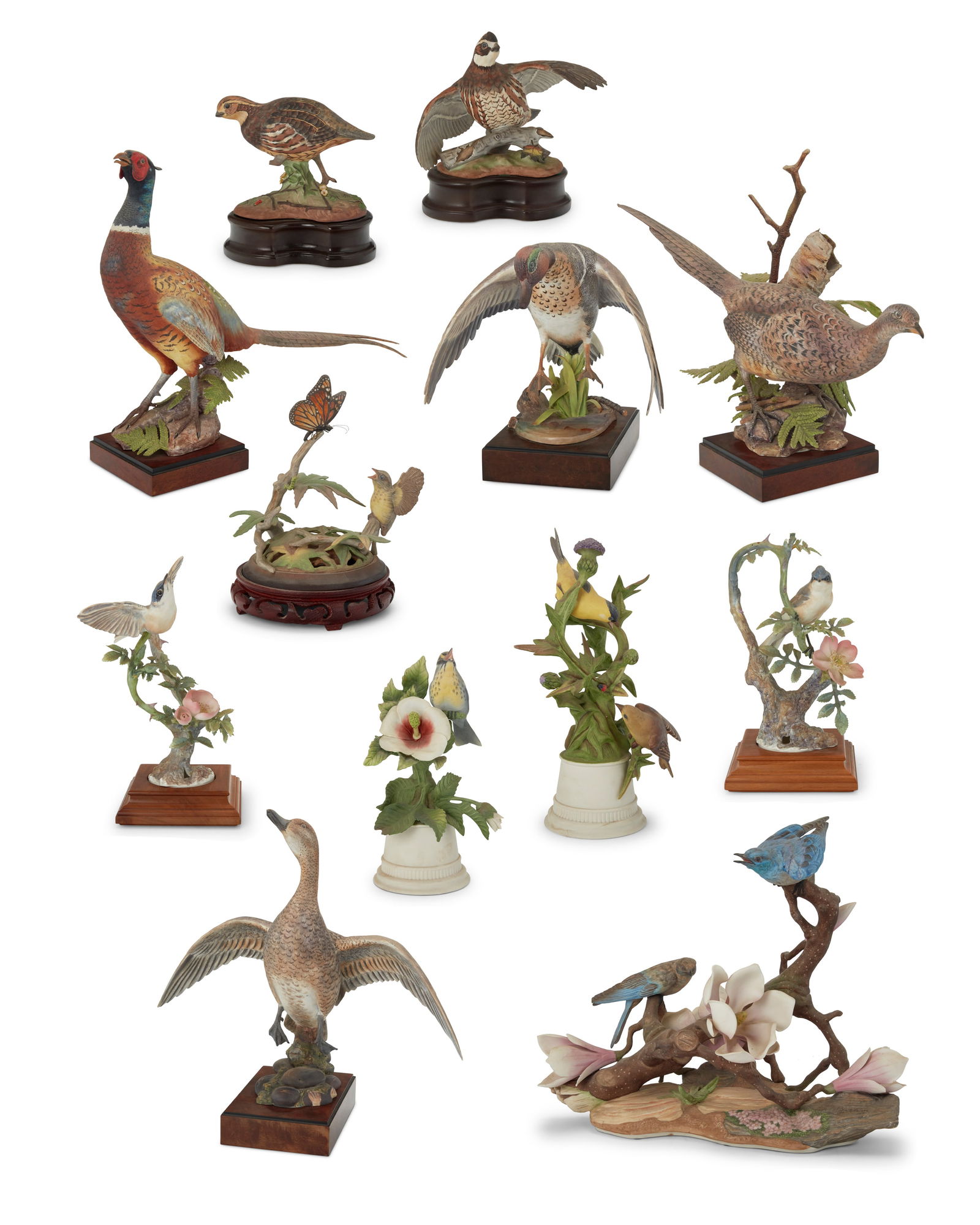 A collection of Royal Worcester porcelain models of birds: A collection of Royal Worcester porcelain models of birdsEarly/mid-20th centuryEach with printed factory marksComprising:Ronald van Ruyckevelt (b. 1928)A pair of "Ring-Necked Pheasant," 1967Impressed