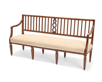 An Italian Neoclassical style walnut settee