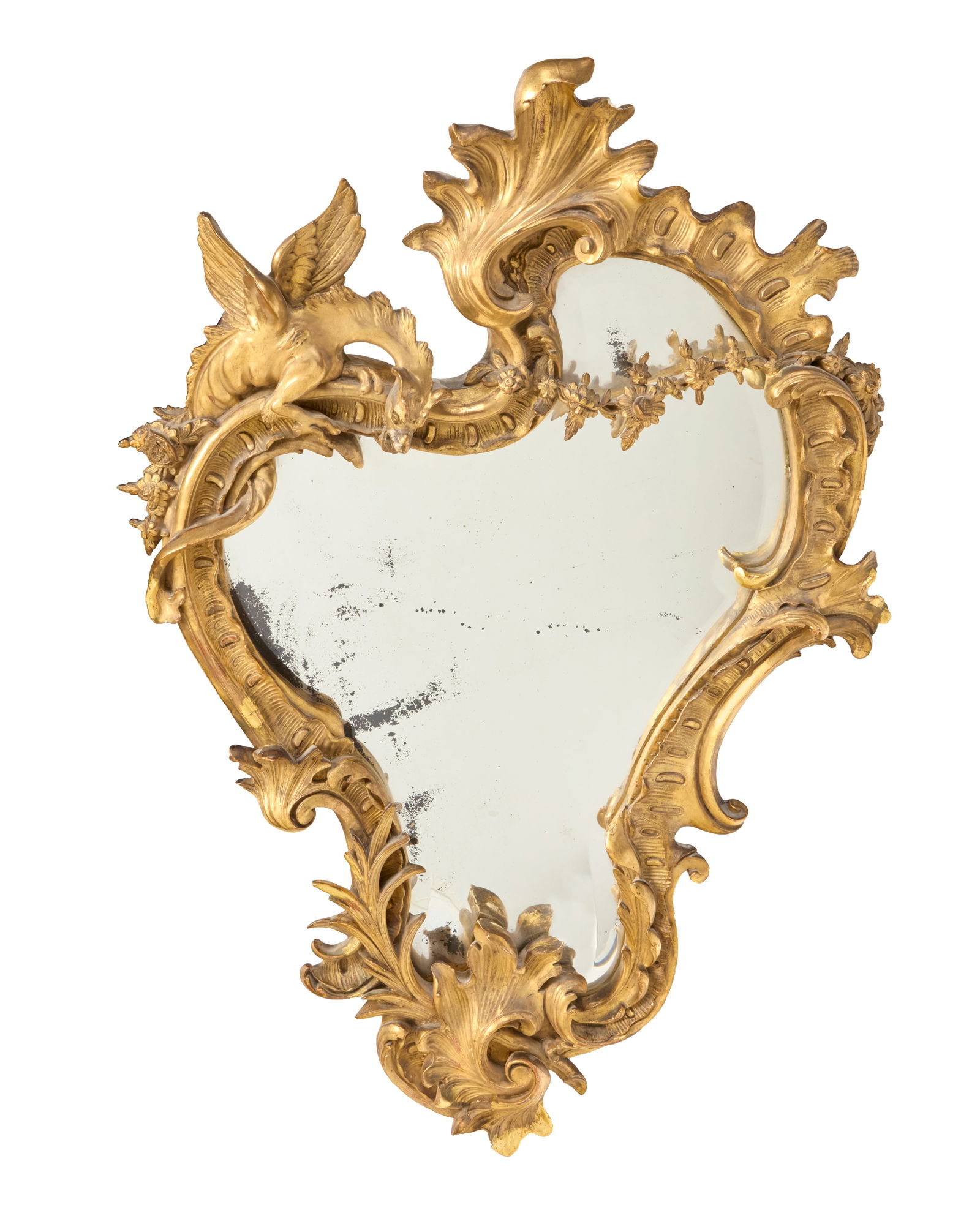 In the manner of Gabriel Viardot (1830-1904), A French Rococo style giltwood mirror: A French Rococo style giltwood mirrorIn the manner of Gabriel Viardot (1830-1906), late 19th/early 20th centuryThe asymmetrical frame with acanthus leaves, rocaille, floral elements, and a dragon in r