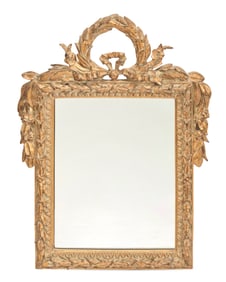 A Louis XVI style giltwood mirror