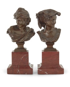 A pair of diminutive French patinated bronze busts