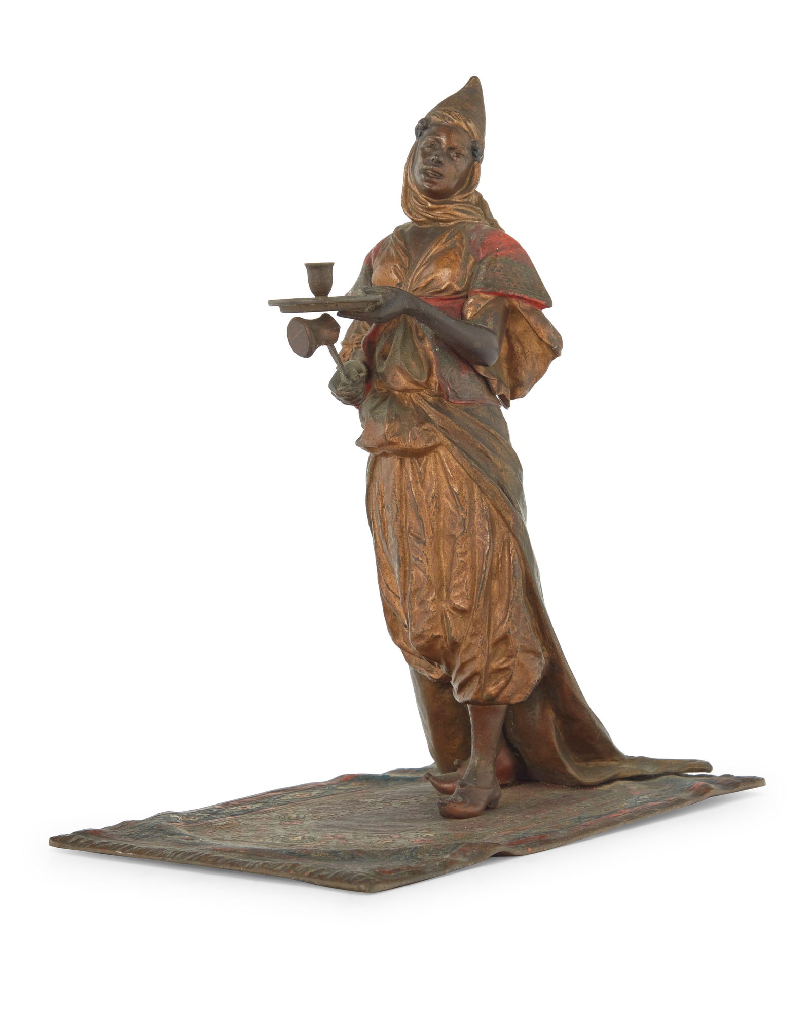 A Viennese cold painted bronze figure of a maiden: A Viennese cold painted bronze figure of a maidenEarly 20th centuryUnmarkedDepicted standing on a Persian rug9.25" H x 8" W x 5" D Provenance:Private Estate, California