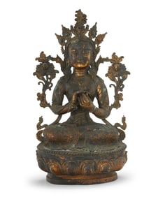 An Asian gilt bronze figure of Tara