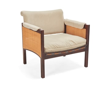 In the manner of Edward Wormley (1907-1995), A Modern caned lounge chair, late 20th century
