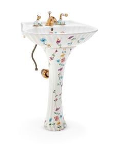 A Les Bains Decores shell-form porcelain pedestal sink