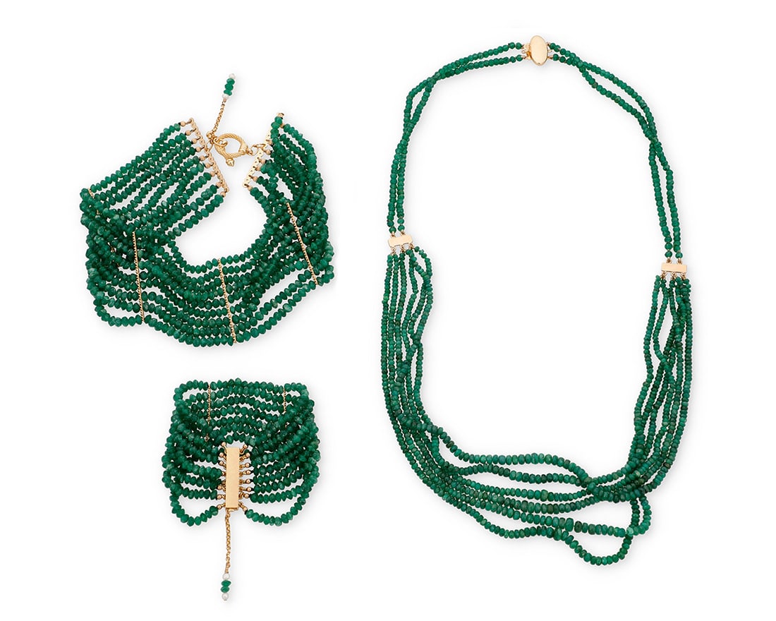 A Gold and Emerald Beaded Group: A Gold and Emerald Beaded GroupIncluding a necklace, collar and bracelet featuring multiple strands of faceted rough emerald beads finished with 14k gold clasps3 piecesNecklace: 26 in., Collar: 13 1/2