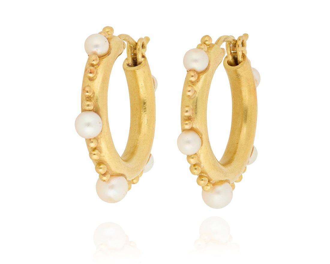A Pair of 18K Gold and Cultured Pearl Earrings: A Pair of 18K Gold and Cultured Pearl Earrings Of a hoop design, featuring ten cultured pearls accented by gold granulation 2 pieces Measures: 1 x 1/8 in. 11.9 grams gross