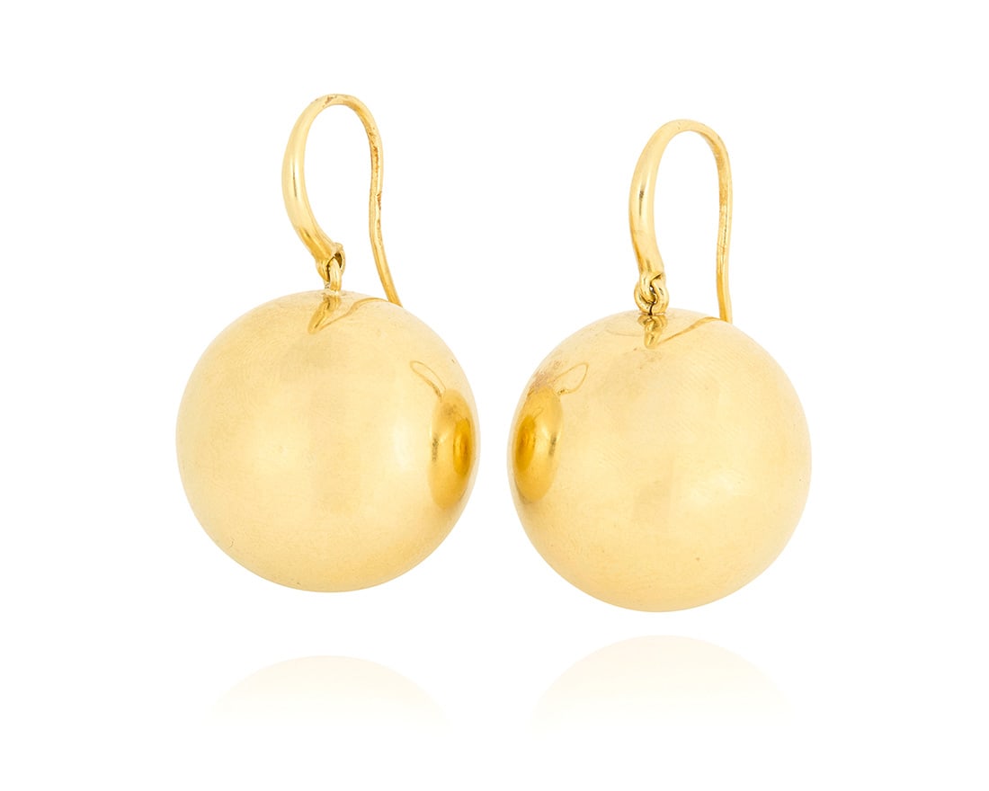 A Pair of 18K Gold Earrings: A Pair of 18K Gold Earrings Of a high polish ball design 2 pieces Measures: 1 x 3/4 in. 11.8 grams