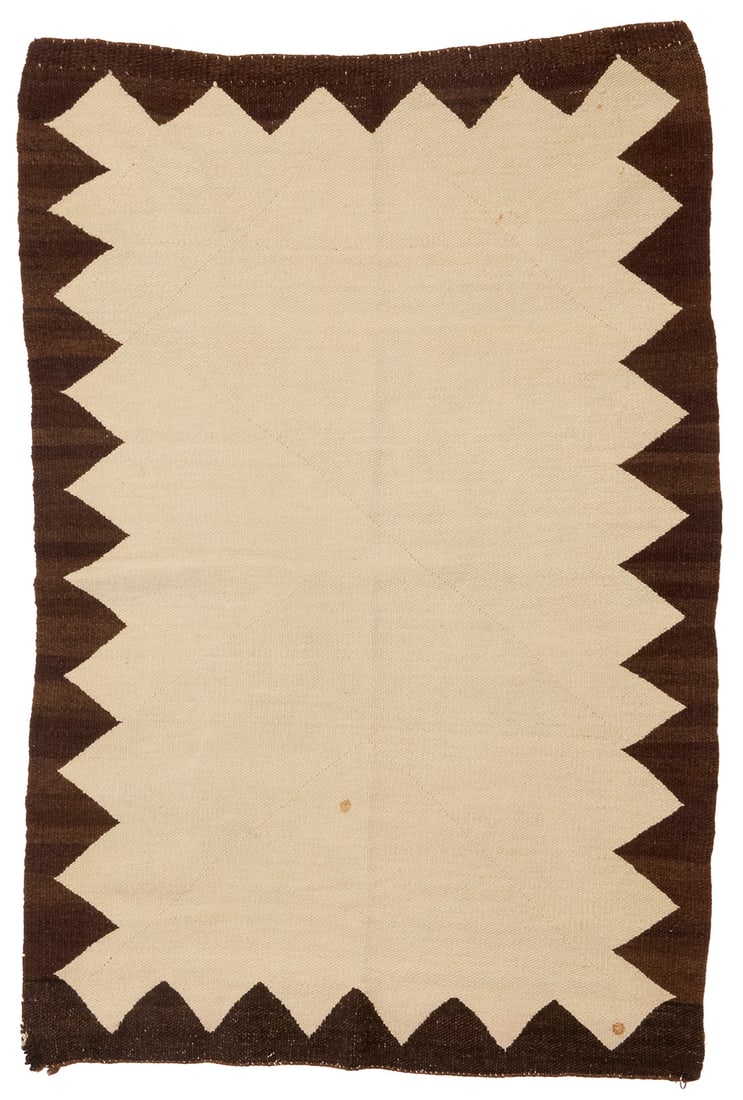 A Navajo double saddle blanket Early 20th century, Dine Woven in cream and dark brown wool with a (1 of 3)