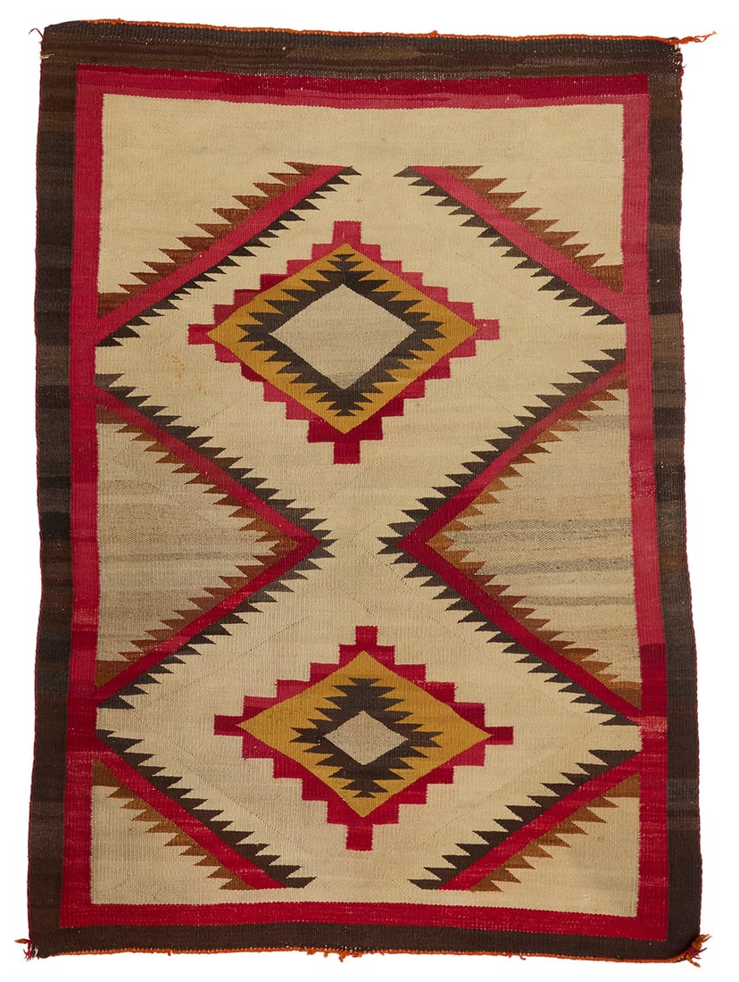 A Navajo saddle blanket Early/mid-20th century, Dine Woven in red, cream, dark brown, tan, and (1 of 3)