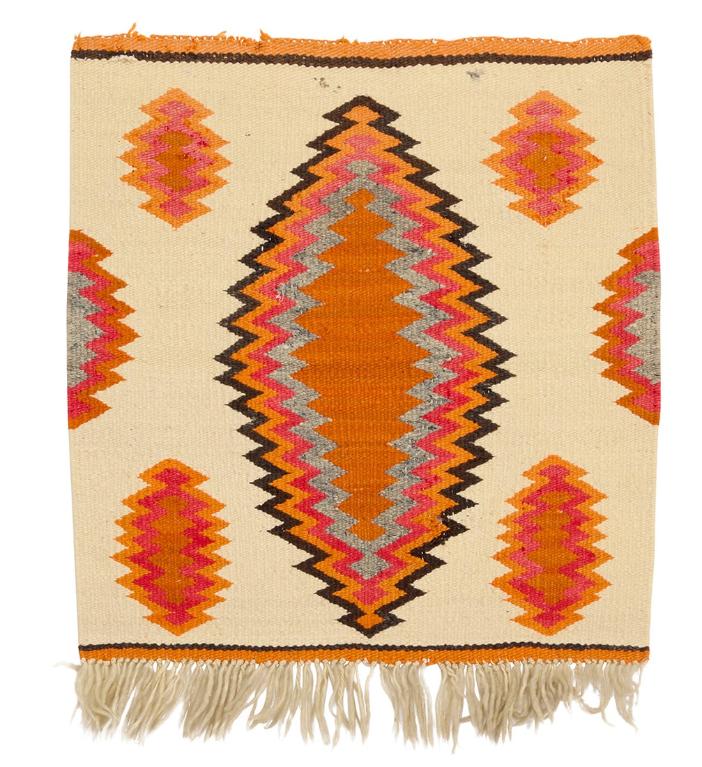 A Navajo Transitional textile Late 19th/ Early 20th century; Dine Woven in cream, orange, red, (1 of 3)
