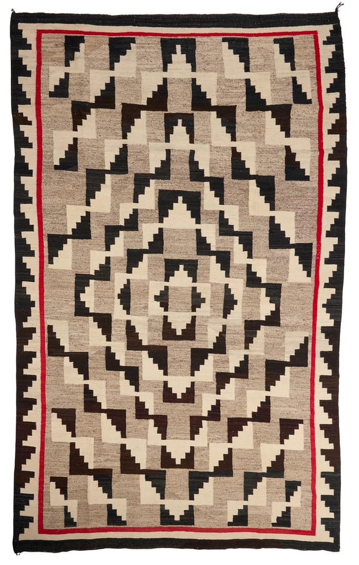 A Navajo optical rug Mid/late 20th century, Dine Woven in red, cream, natural grey, and black (1 of 3)
