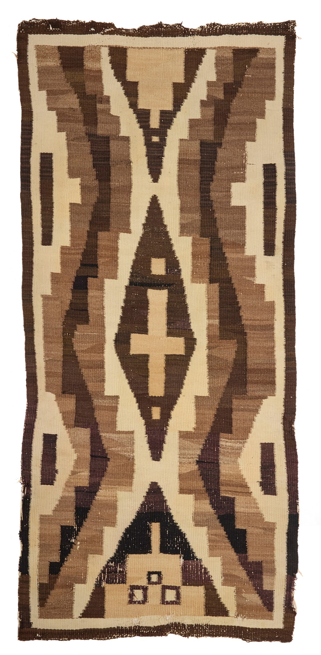 A Navajo regional rug Early 20th century, Dine Woven in black, brown, natural brown, and cream (1 of 3)