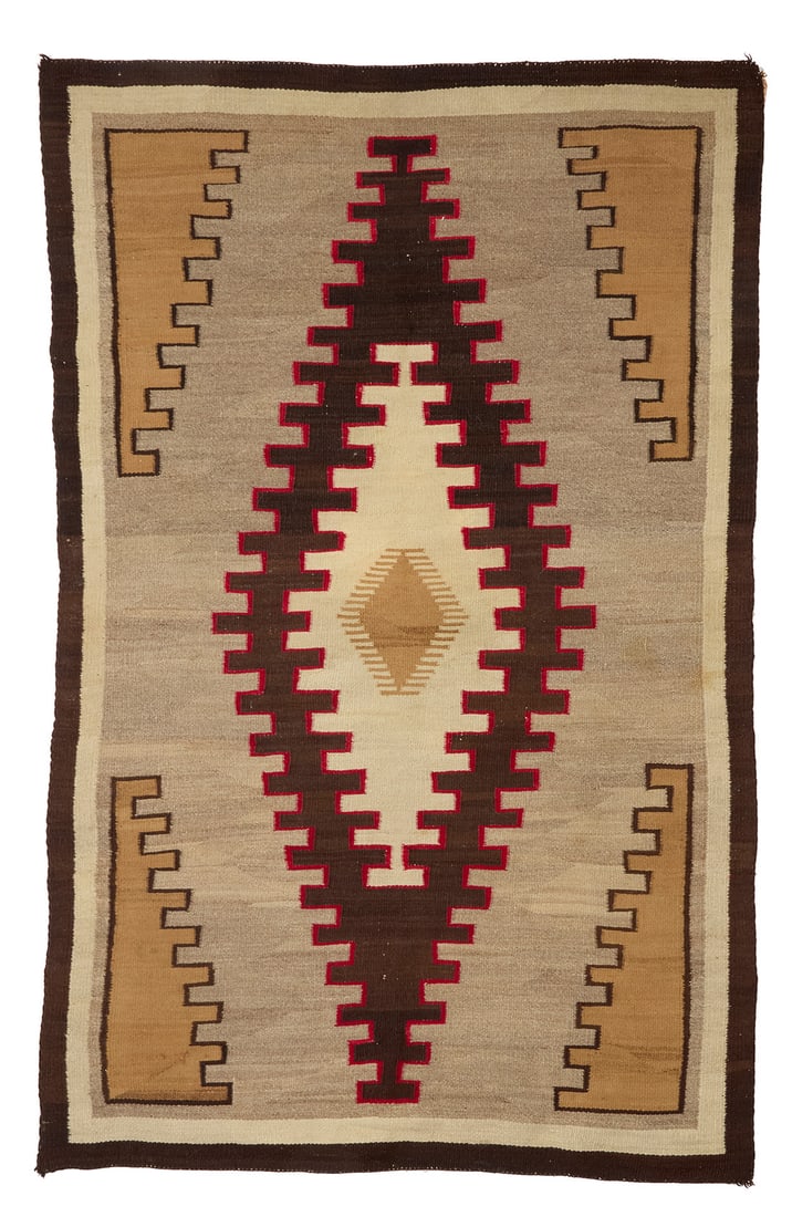 A Navajo regional rug Early 20th century, Dine Woven in red, cream, natural grey, dark brown, and (1 of 3)