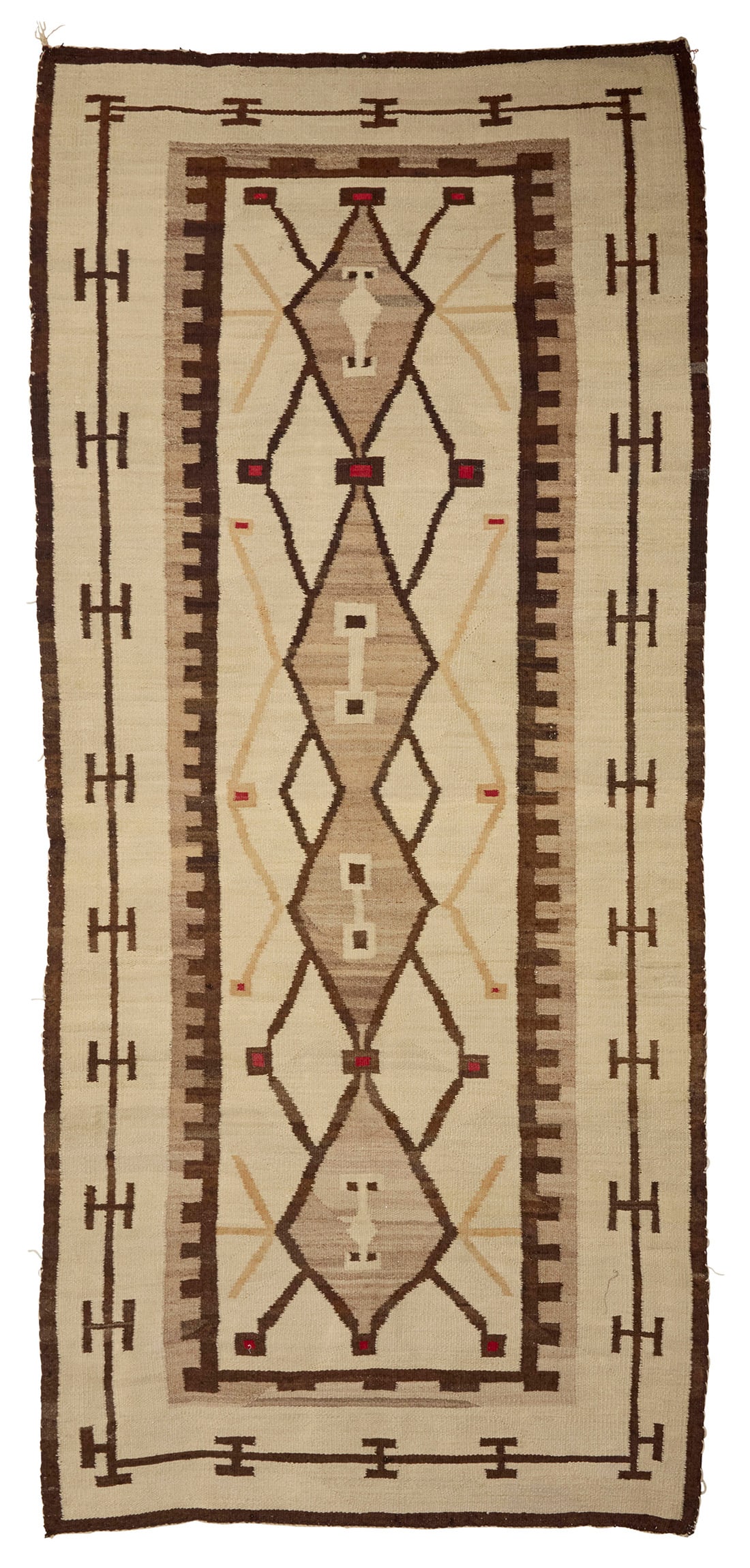 A Navajo regional rug Early 20th century, Dine Woven in cream, natural brown, ochre, red, and dark (1 of 3)