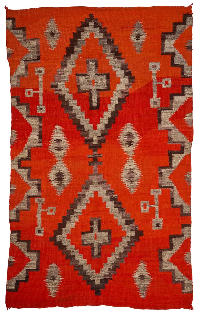 A Navajo Transitional blanket Late 19th/early 20th century, Dine Woven in red, natural grey, and (1 of 3)